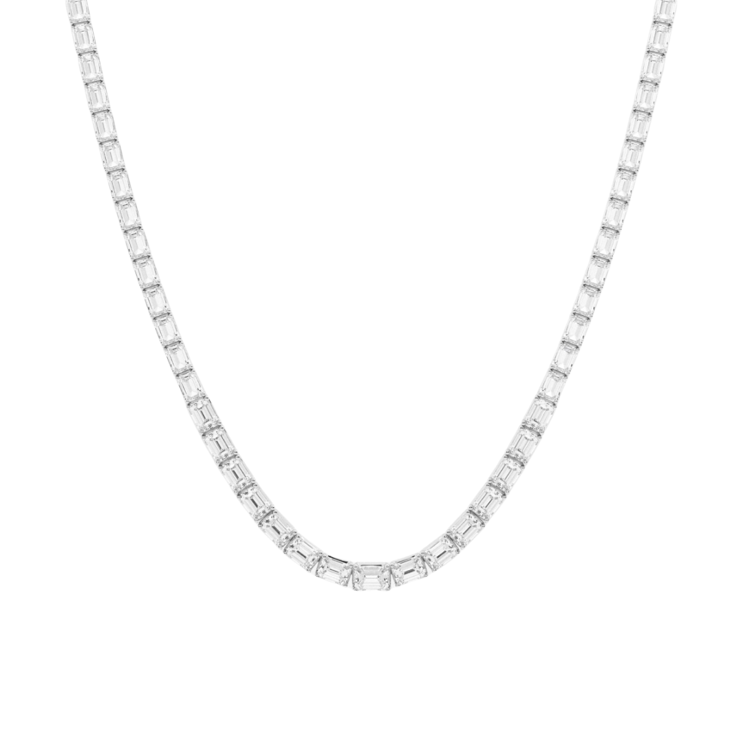 East to west emerald cut diamond tennis necklace featuring 23 carats of dazzling emerald-cut diamonds