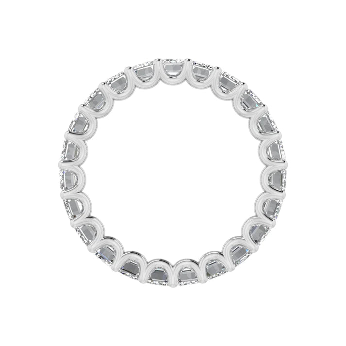 Emerald cut diamond eternity band featuring a continuous circle of radiant emerald-cut diamonds