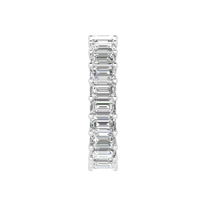 Emerald cut diamond eternity band featuring a continuous circle of radiant emerald-cut diamonds