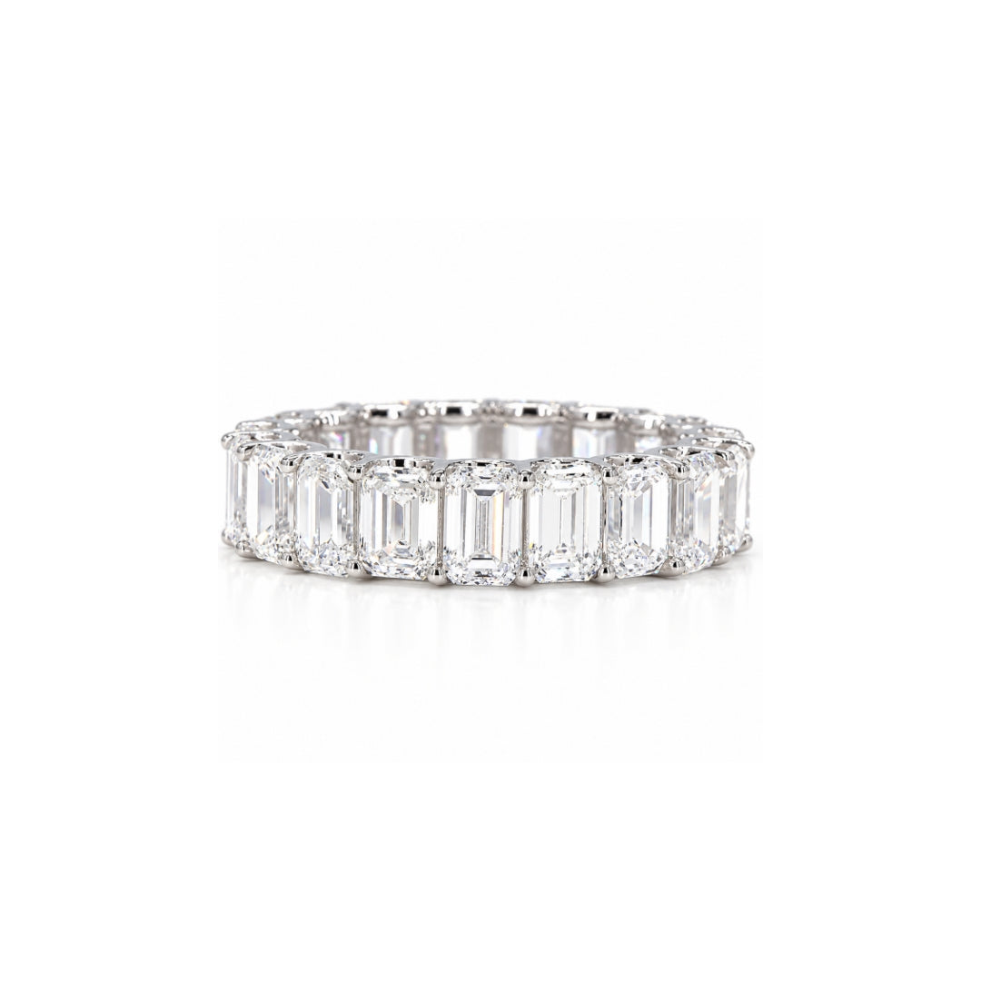 Emerald cut diamond eternity band in white gold with matched 4x3mm stones in a shared-prong setting