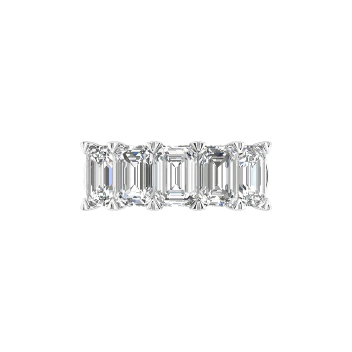 Five stone emerald cut diamond ring featuring 5 carats total weight, with elegant diamonds set in a sleek and timeless band.