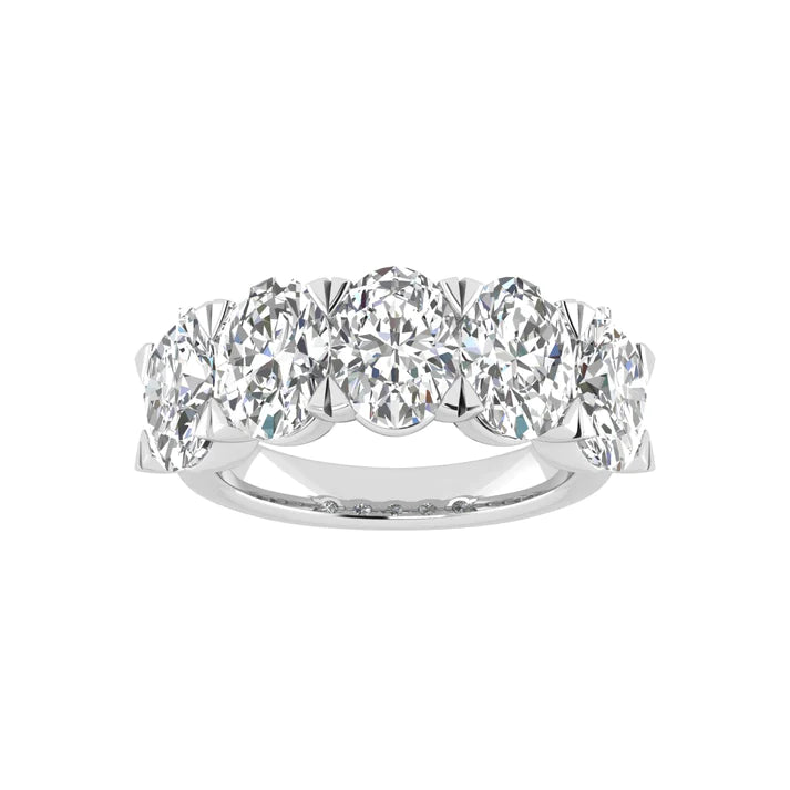 Five-stone ring featuring 5 carats of oval cut diamonds, elegantly set in a sleek band for a timeless and luxurious look