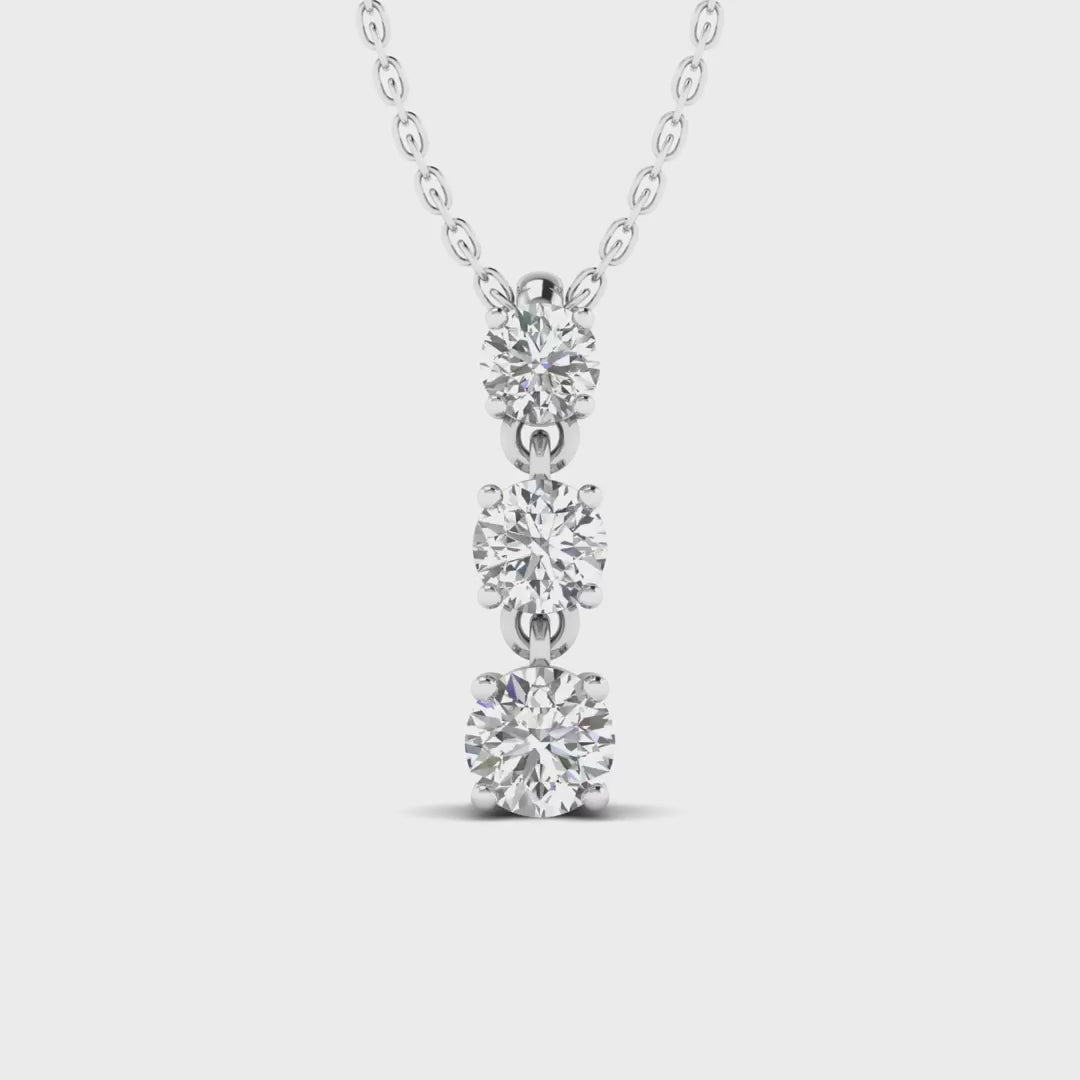 14k gold round diamond graduated drop pendant with 3 lab-created diamonds by Sakaris Jewelers