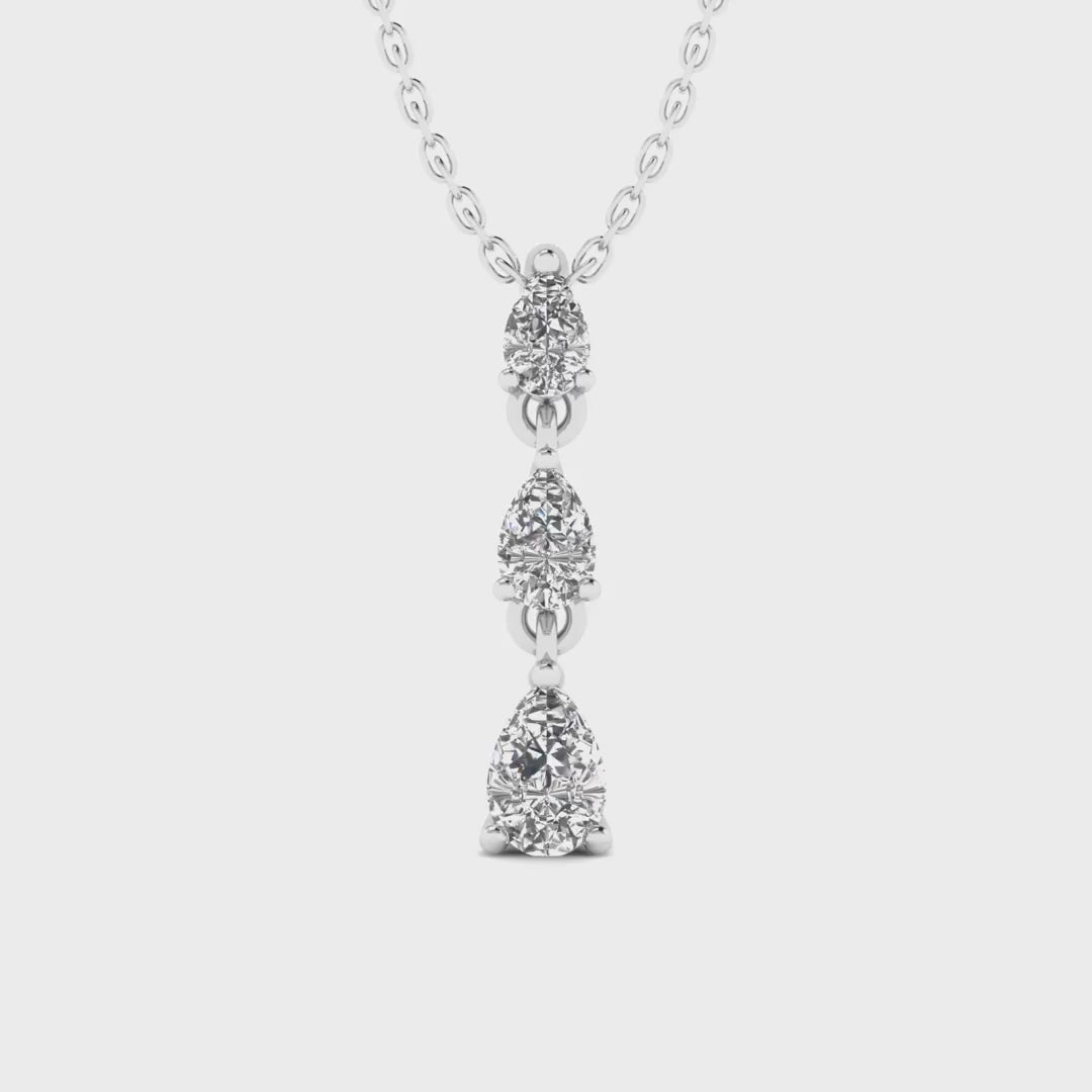 Pear diamond graduated pendant featuring three pear-shaped diamonds in a cascading design, set in 14k