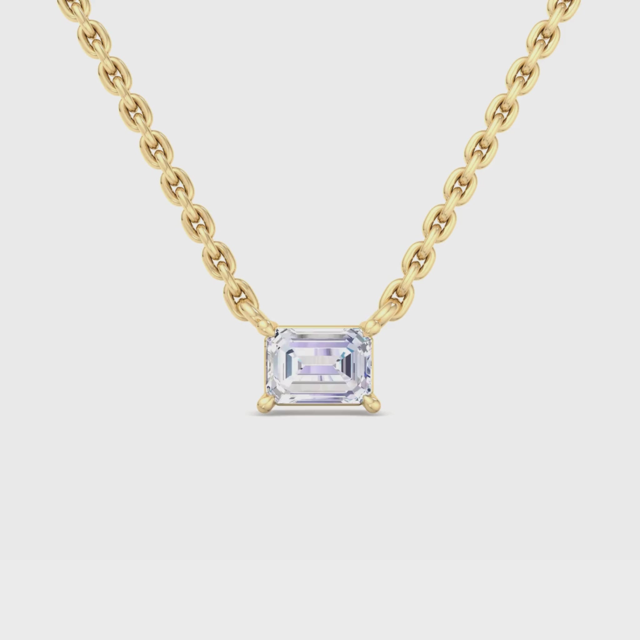 14k gold east to west emerald cut diamond pendant with lab-created diamond by Sakaris Jewelers