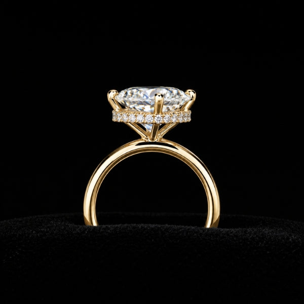 Custom hidden halo engagement ring crafted by Sakaris Jewelers Naples Florida