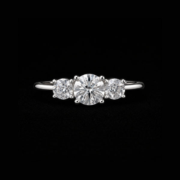 Custom three stone engagement ring designed and crafted by Sakaris Jewelers Naples Florida