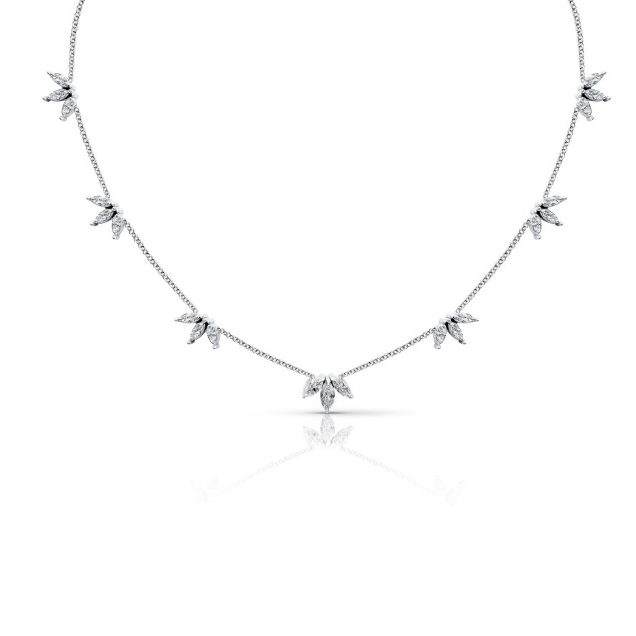 14K gold necklace with evenly spaced marquise diamond clusters, set in groups of three along a delicate chain.