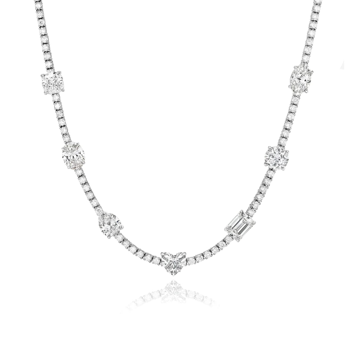 14K gold diamond tennis chain featuring a row of round diamonds with evenly spaced larger oval, round, emerald, heart, and pear-shaped diamonds.