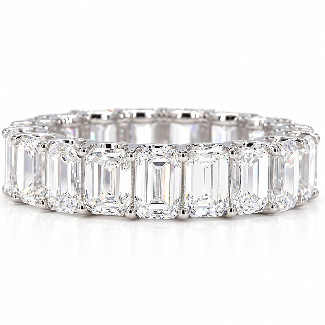 Emerald cut diamond eternity band in white gold with matched 4x3mm stones in a shared-prong setting zoomed