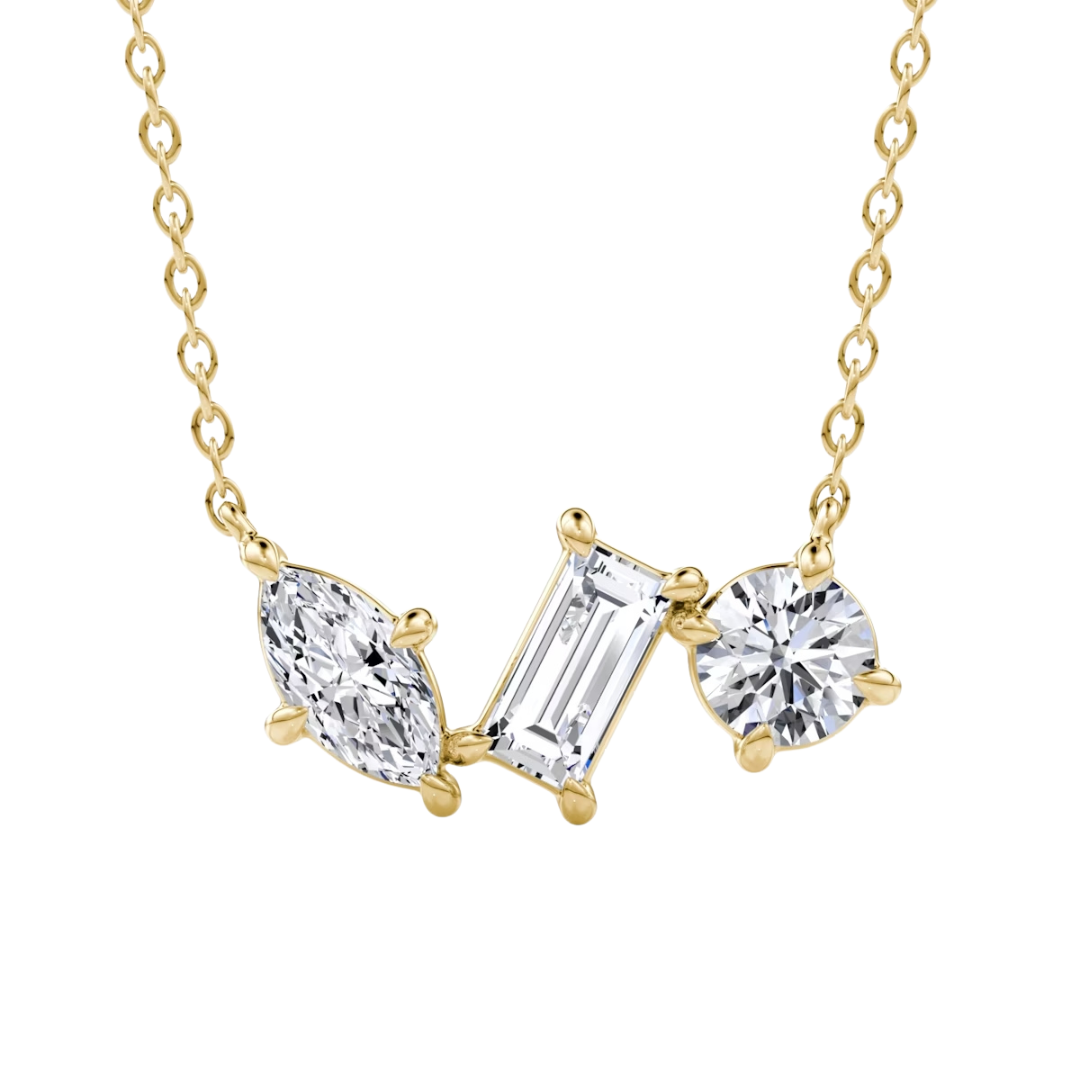 A stunning necklace featuring three diamonds: an emerald cut, a marquise cut, and a round cut. Elegant and timeless, this piece is fully customizable with your choice of diamond type and metal. Perfect for any occasion!