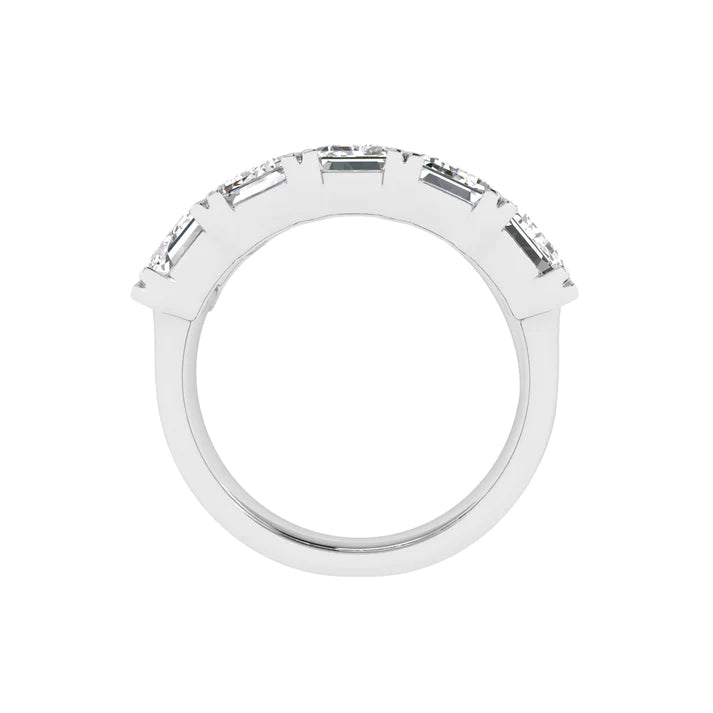 Five stone emerald cut diamond ring featuring 5 carats total weight, with elegant diamonds set in a sleek and timeless band.