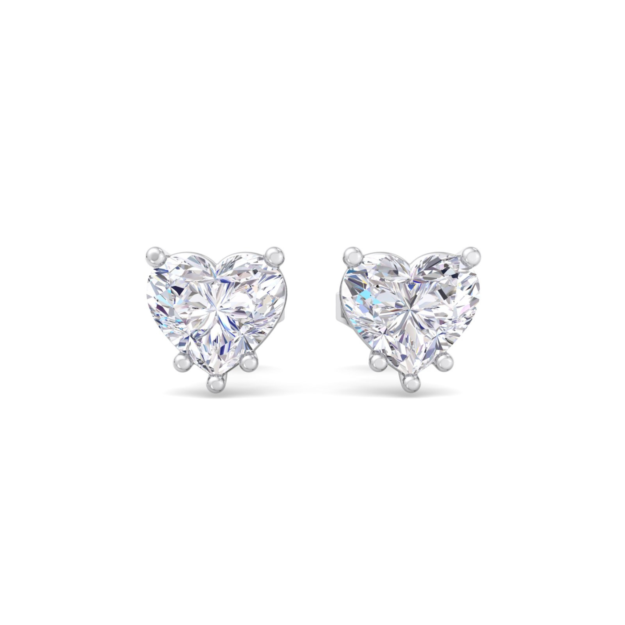 A pair of heart-shaped diamond stud earrings featuring brilliant heart-shaped diamonds with secure backing, perfect for a romantic and elegant look.