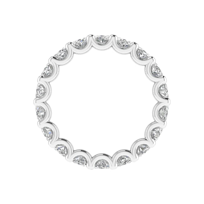 Oval diamond eternity band with 5 carat total weight, featuring a seamless row of sparkling oval-shaped diamonds in an elegant and timeless design.