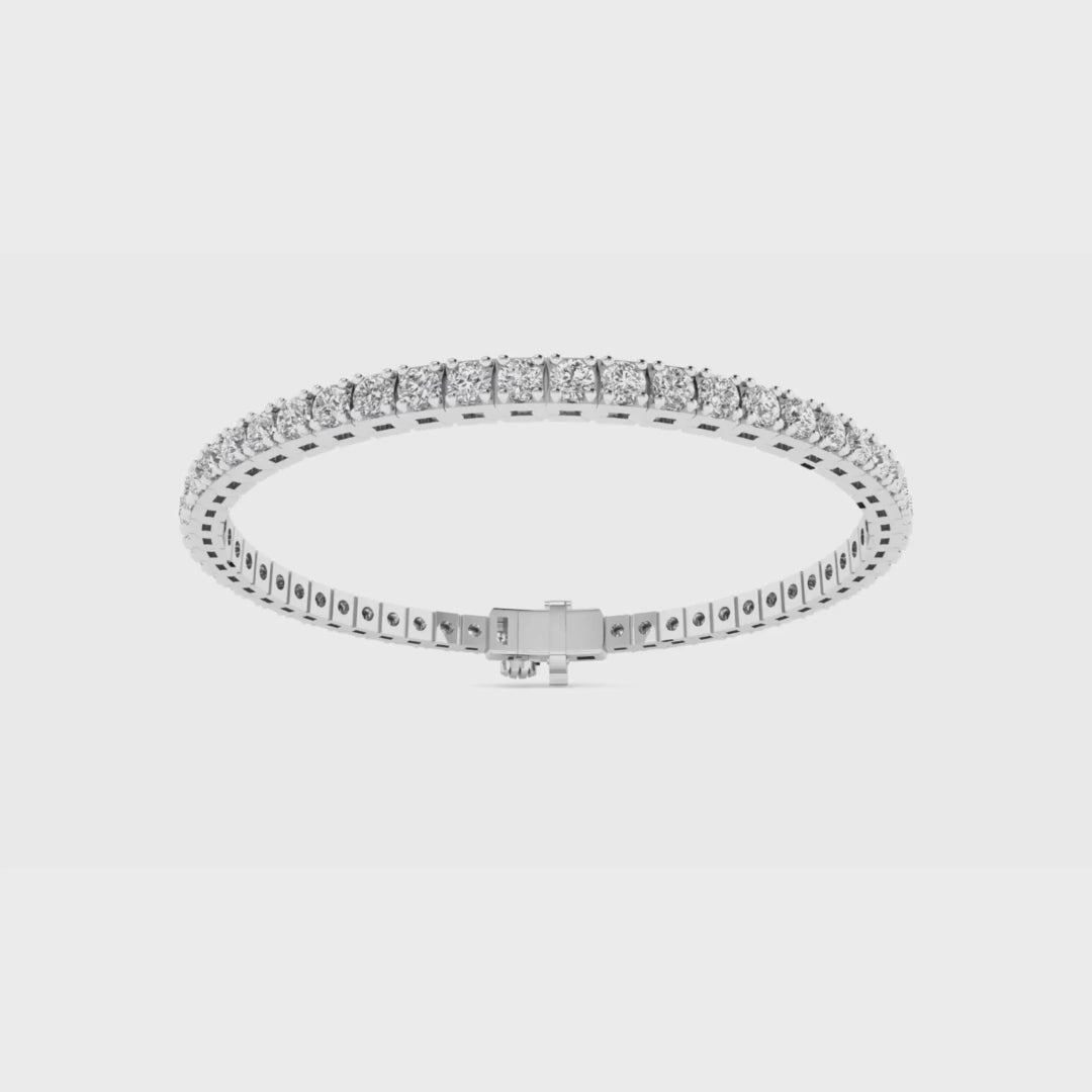 14k gold round diamond tennis bracelet with 5ct or 7ct lab-created diamonds by Sakaris Jewelers