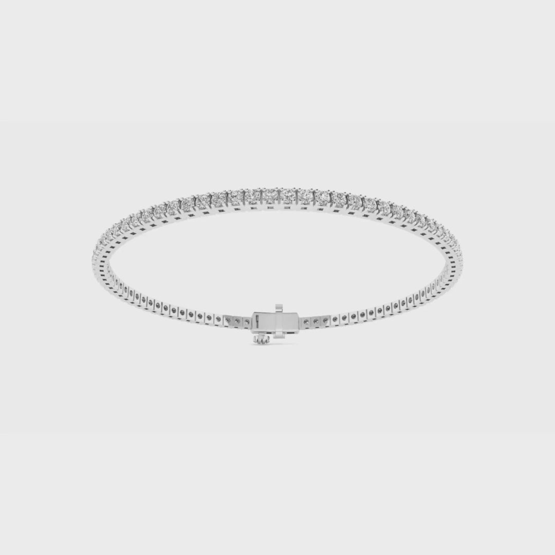 Round diamond tennis bracelet in 2ct and 3ct, 14k white and yellow gold from Sakaris Jewelers