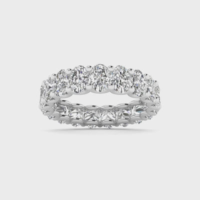 Oval diamond eternity band available in 3 carat and 4 carat total weight, featuring a continuous circle of brilliant oval-shaped diamonds in an elegant design.
