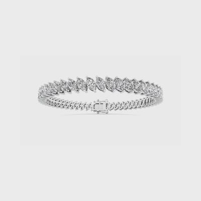 14K gold tennis bracelet featuring marquise-cut diamonds set in a continuous row for a sophisticated and timeless look.