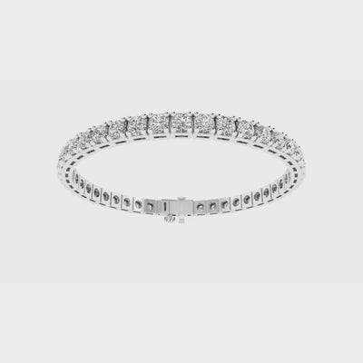 14k gold round diamond tennis bracelet with 9ct, 10.5ct, or 12ct lab-created diamonds by Sakaris Jewelers