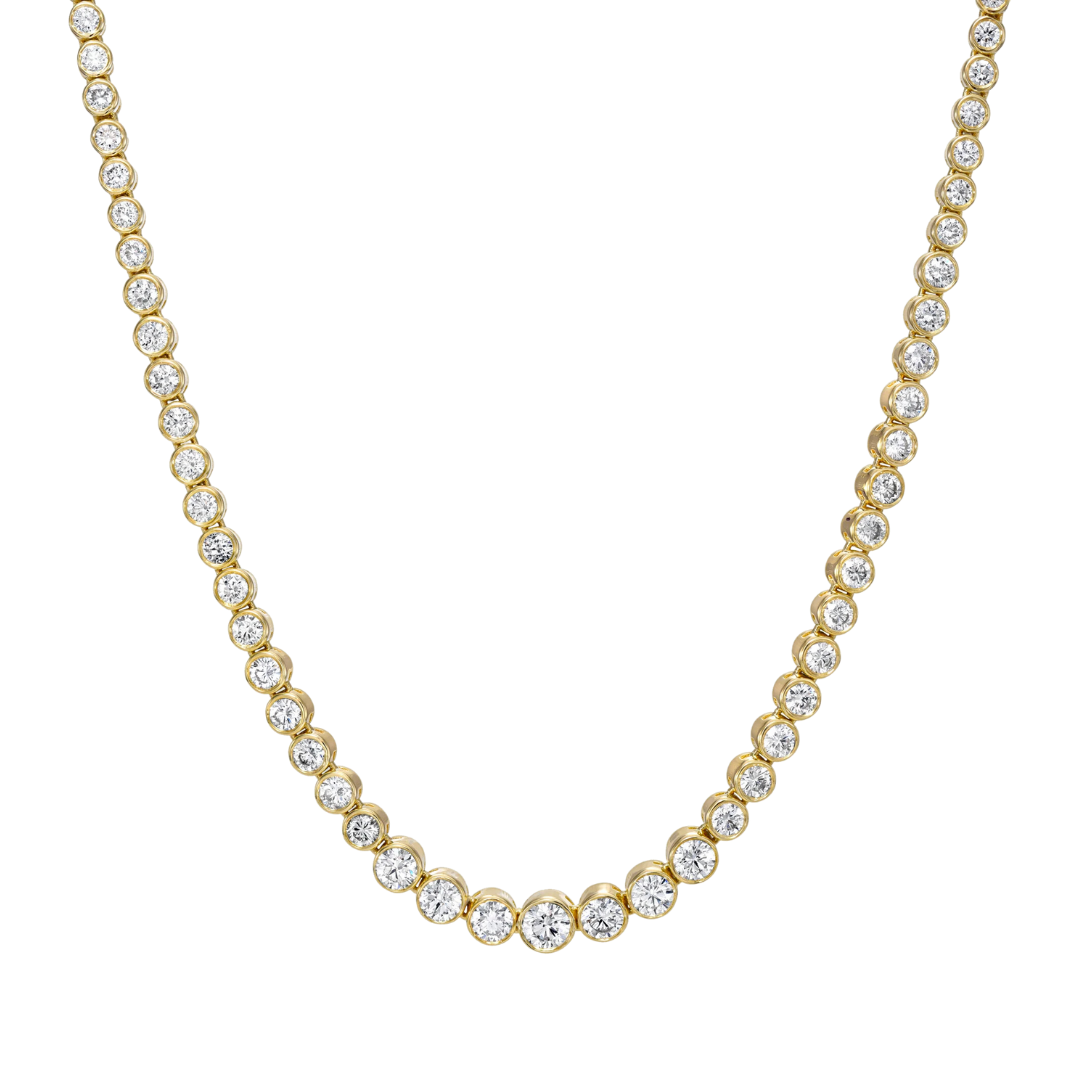 Round diamond graduated bezel set tennis necklace featuring brilliant diamonds in a sleek, graduated design, crafted in 14k