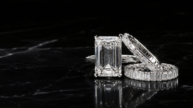 Custom platinum engagement ring and wedding bands designed by Sakaris Jewelers Naples Florida